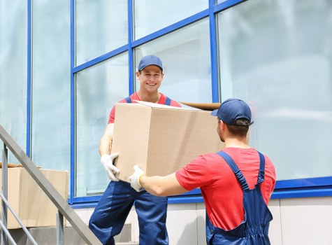Removal team preparing items safely with protective planning