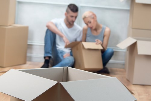 Removal van loading household furniture and boxes in Officeremovals