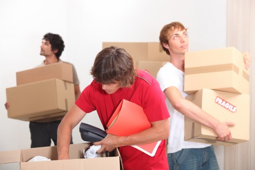 Packed office boxes and equipment ready for commercial removal