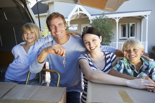 Loading household items into a moving van in Officeremovals