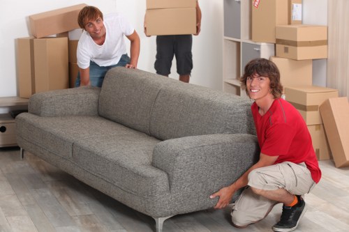 Local removals crew assisting with packing and transport preparation