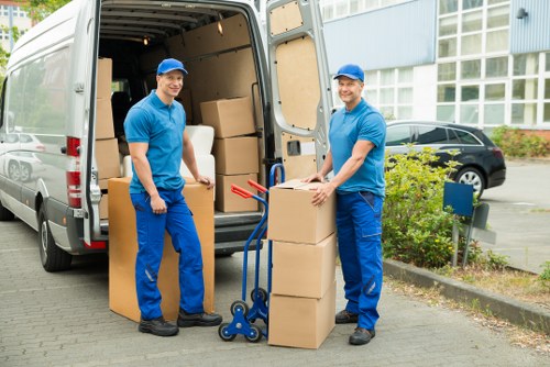 Local team collecting bulky furniture from a property in Officeremovals