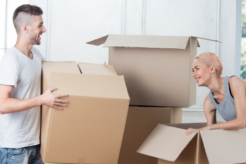 A suburban property move with careful handling of household items